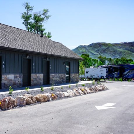 Spacious RV sites with stunning mountain views at Riverside RV Luxury Resort in South Weber, Utah.